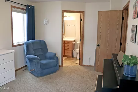 Living - 156 Burke Dr, Lincoln, ND 58504 photo 3 of 6