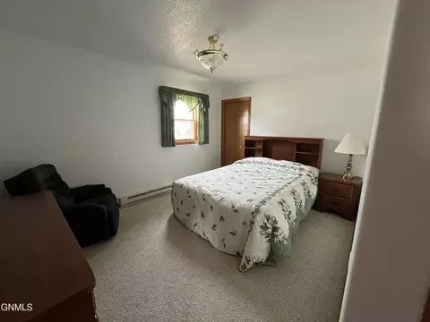 Bedroom - 522 3rd Ave NE, Ashley, ND 58413 photo 3 of 12