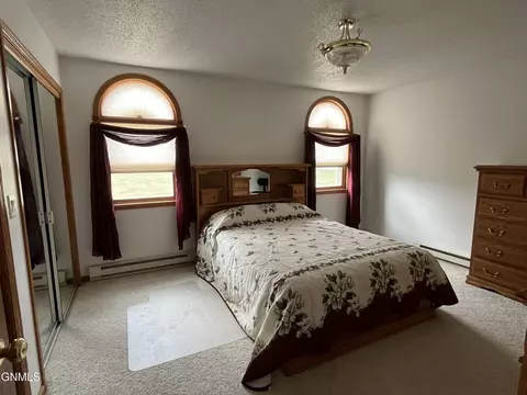 Bedroom - 522 3rd Ave NE, Ashley, ND 58413 photo 8 of 12