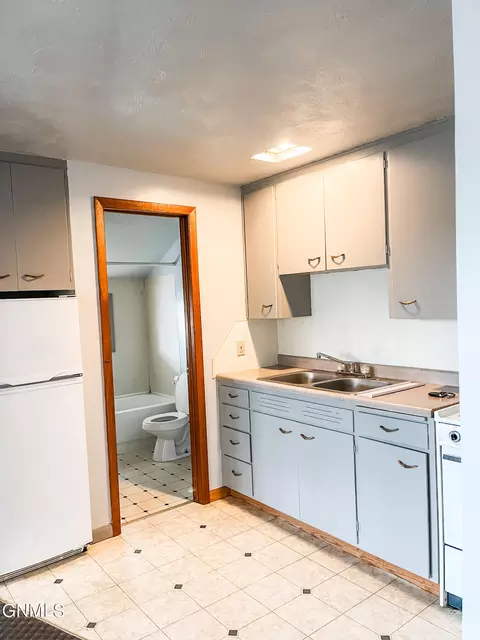 Kitchen - 120 4th St W, Williston, ND 58801 photo 3 of 4