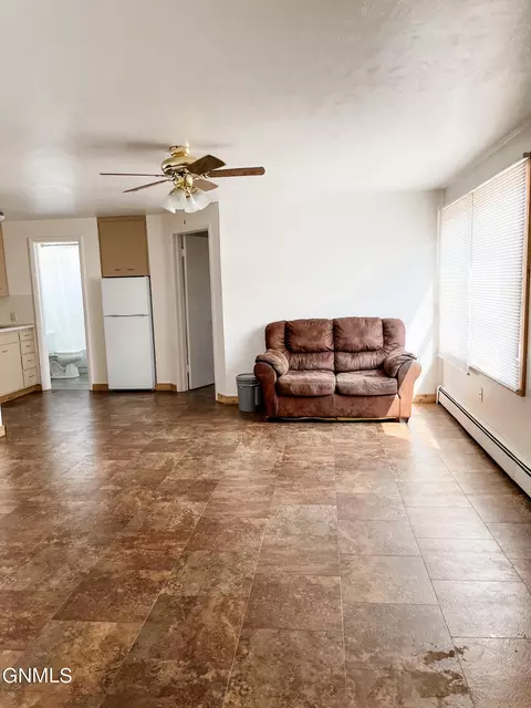 Living - 120 4th St W, Williston, ND 58801 photo 1 of 1