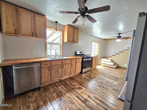 Kitchen - 214 Parker St, Alamo, ND 58830 photo 1 of 2