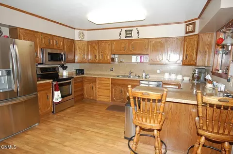 Kitchen - 221 5th Ave SE, Sidney, MT 59270 photo 2 of 2