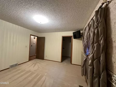 Bedroom - 719 8th St E, Williston, ND 58801 photo 2 of 4