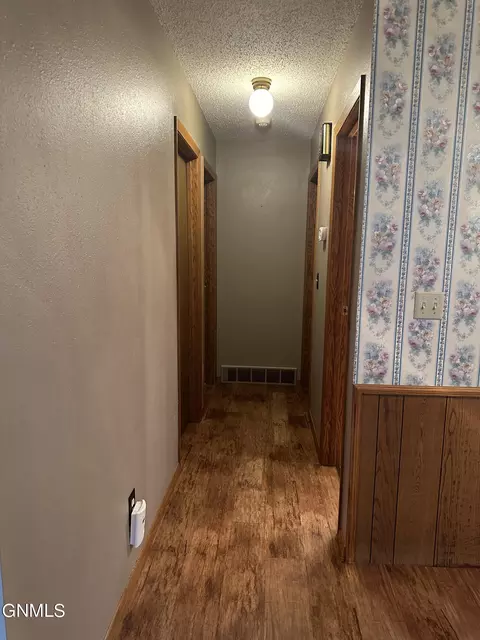 Entry Way - 719 8th St E, Williston, ND 58801 photo 1 of 3