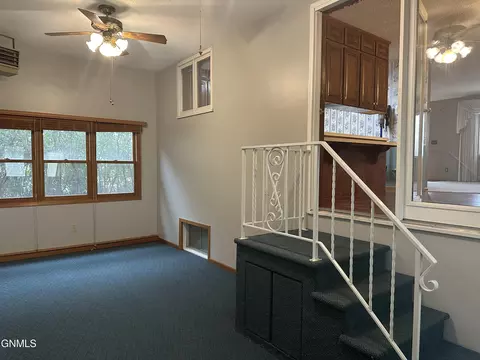 Living - 719 8th St E, Williston, ND 58801 photo 2 of 2