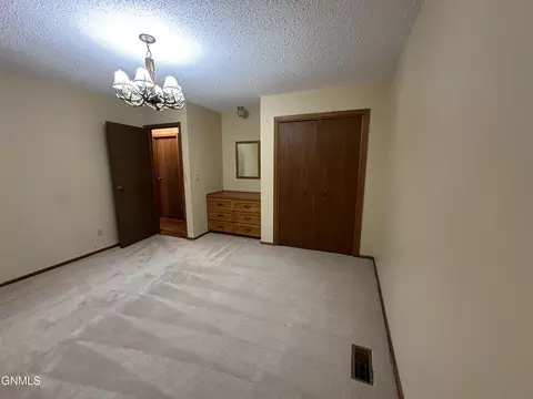 Bedroom - 719 8th St E, Williston, ND 58801 photo 4 of 4