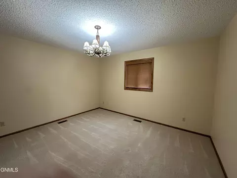 Bedroom - 719 8th St E, Williston, ND 58801 photo 3 of 4