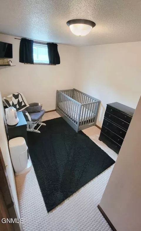 Bedroom - 5609 Carolville Loop, Williston, ND 58801 photo 4 of 4