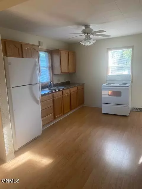 Kitchen - 953 3rd Ave W, Dickinson, ND 58601 photo 1 of 2