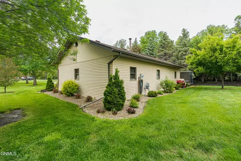 Exterior - 9405 Oak Dr, Bismarck, ND 58503 photo 7 of 52