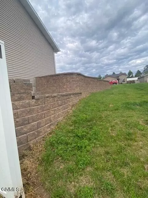 Exterior - 1471 4th Ave E, Dickinson, ND 58601 photo 5 of 7