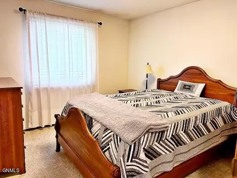 Bedroom - 1207 E Ridge Ct, Williston, ND 58801 photo 2 of 3
