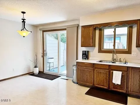 Kitchen - 1207 E Ridge Ct, Williston, ND 58801 photo 2 of 3