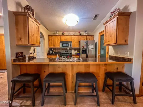 2100 Sundancer Loop SE, Mandan, ND 58554 photo 4