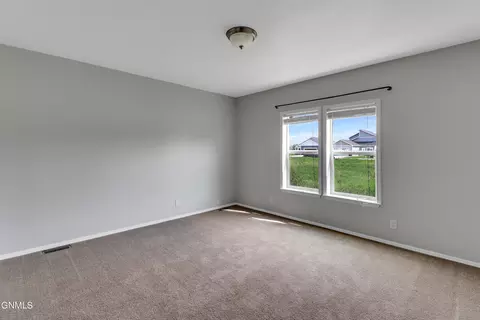 Bedroom - 616 40th St E, Williston, ND 58801 photo 3 of 4