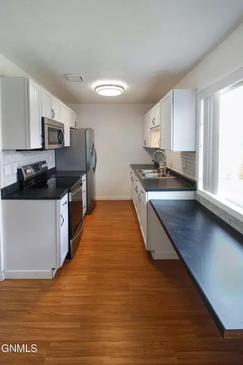 Kitchen - 2701 Pheasant Run Pkwy, Williston, ND 58801 photo 1 of 3