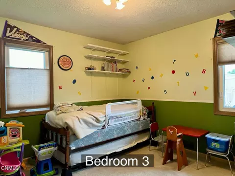 Bedroom - 516 11th St W, Williston, ND 58801 photo 3 of 4