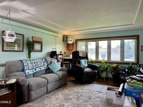 Living - 516 11th St W, Williston, ND 58801 photo 2 of 2