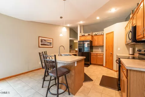 Kitchen - 3000 Plainview Dr SE, Mandan, ND 58554 photo 2 of 3