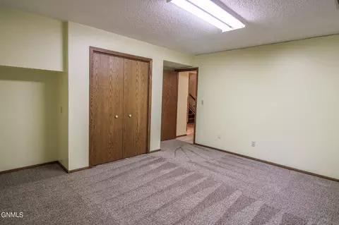 Bedroom - 306 N Brandon Loop, Bismarck, ND 58503 photo 8 of 9
