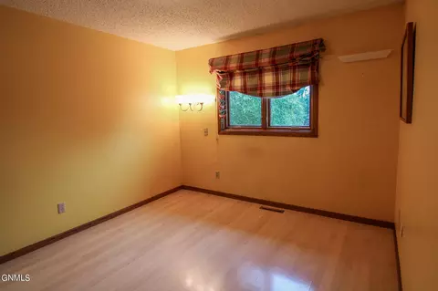 Bedroom - 306 N Brandon Loop, Bismarck, ND 58503 photo 7 of 9