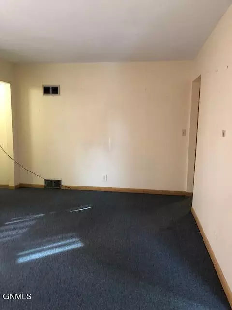 Living - 518 12th Ave W, Williston, ND 58801 photo 2 of 3