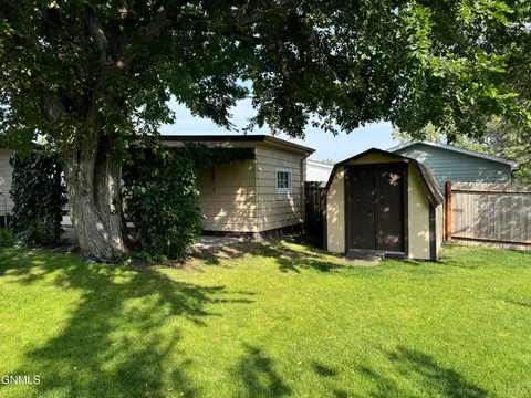 Exterior - 211 4th Ave E, Ray, ND 58849 photo 4 of 14