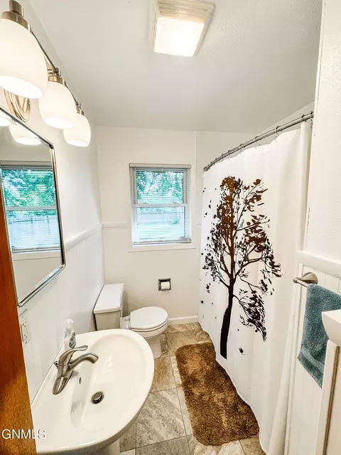 Bath - 211 4th Ave E, Ray, ND 58849 photo 1 of 2