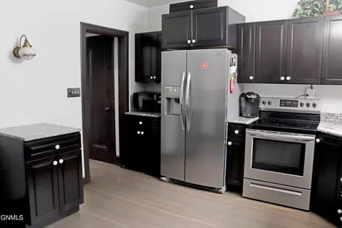 Kitchen - 323 B Ave E, Bismarck, ND 58501 photo 4 of 5