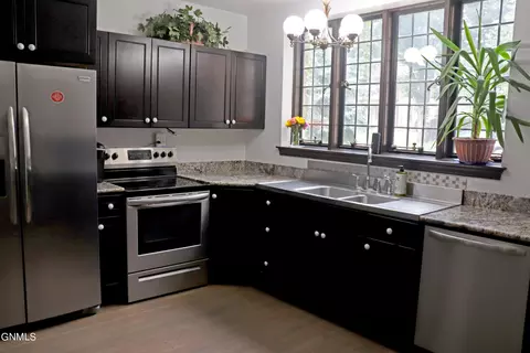 Kitchen - 323 B Ave E, Bismarck, ND 58501 photo 1 of 5