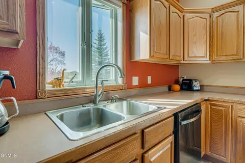Kitchen - 7600 22nd Ave SE, Bismarck, ND 58504 photo 5 of 6