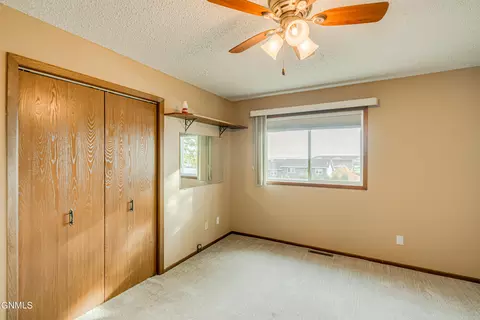 Bedroom - 2601 8th Ave NW, Mandan, ND 58554 photo 8 of 9