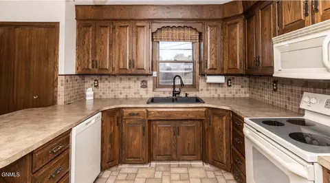 Kitchen - 103 12th St NW, Mandan, ND 58554 photo 4 of 4