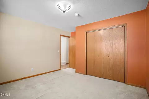 Bedroom - 1826 15th Ave W, Williston, ND 58801 photo 4 of 10