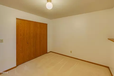 Bedroom - 421 E Brandon Dr, Bismarck, ND 58503 photo 2 of 12