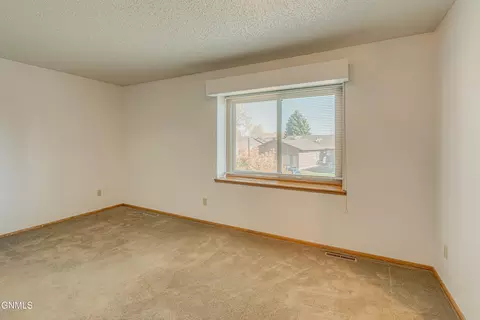 Bedroom - 421 E Brandon Dr, Bismarck, ND 58503 photo 8 of 12