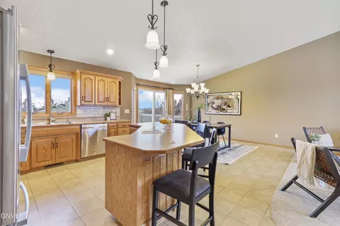 Kitchen - 3000 Remuda Dr, Bismarck, ND 58503 photo 3 of 5