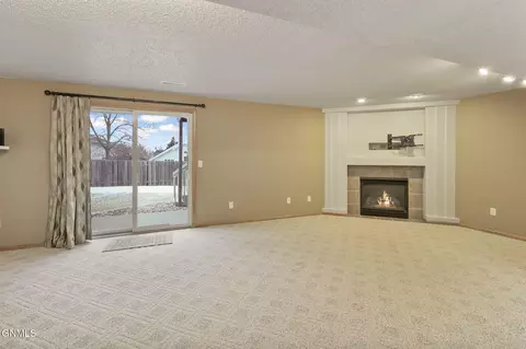 Living - 3000 Remuda Dr, Bismarck, ND 58503 photo 2 of 2