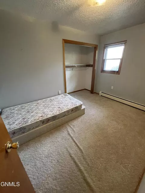 Bedroom - 45 1st St S, Halliday, ND 58636 photo 4 of 5