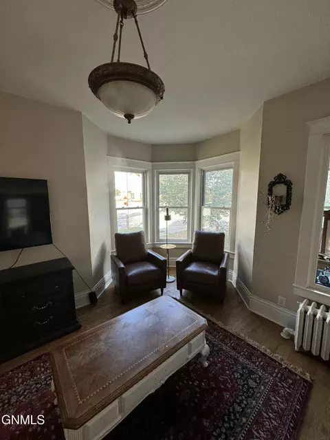 Living - 821 Main St, Williston, ND 58801 photo 3 of 3