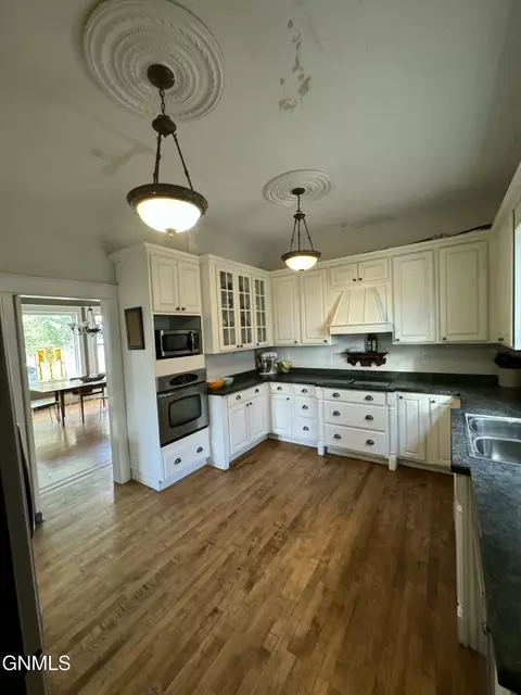 Kitchen - 821 Main St, Williston, ND 58801 photo 2 of 3