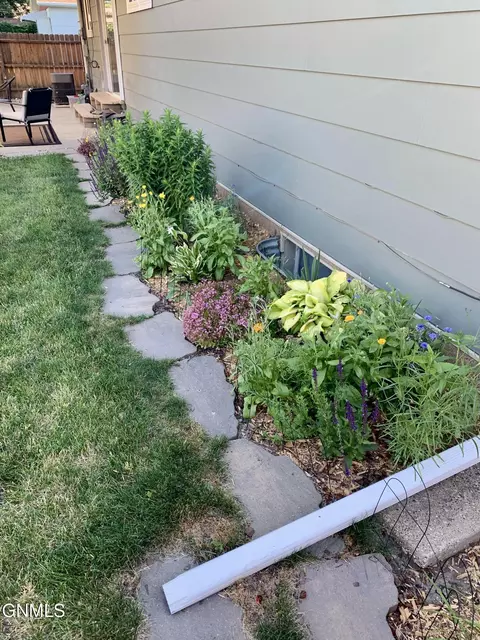 Exterior - 1902 Assumption Dr, Bismarck, ND 58501 photo 11 of 13