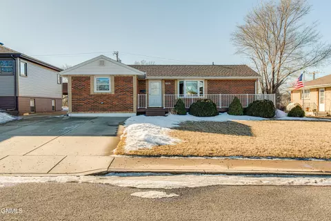 Exterior - 1405 Monte Dr NW, Mandan, ND 58554 photo 7 of 10