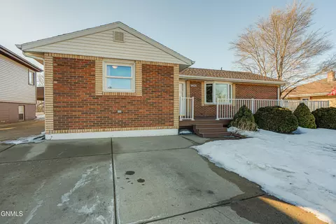 Exterior - 1405 Monte Dr NW, Mandan, ND 58554 photo 8 of 10