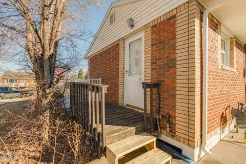 Exterior - 1405 Monte Dr NW, Mandan, ND 58554 photo 6 of 10