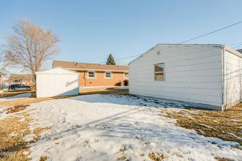 Exterior - 1405 Monte Dr NW, Mandan, ND 58554 photo 3 of 10