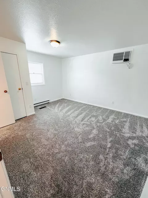 Bedroom - 614 3rd Ave W, Williston, ND 58801 photo 5 of 12