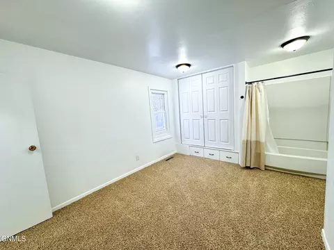 Bedroom - 614 3rd Ave W, Williston, ND 58801 photo 3 of 12