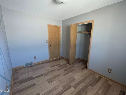 Bedroom - 709 Johns Dr, Mandan, ND 58554 photo 2 of 9
